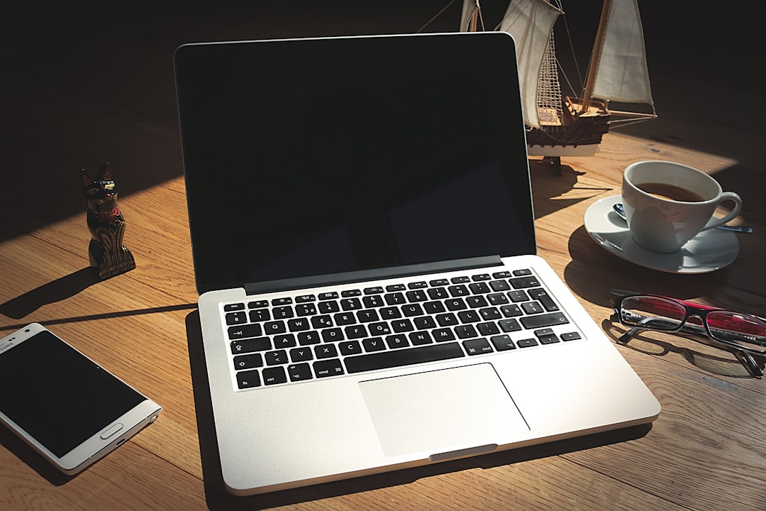 About Notebook and Smartphone on a Desk